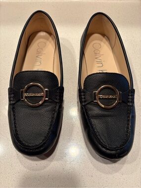 Calvin Klein Black Leather Loafers with Gold-Tone Logo Ring